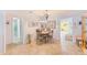 Inviting dining area with tiled flooring, adjacent to living spaces, perfect for entertaining at 11200 102Nd Ave # 75, Seminole, FL 33778