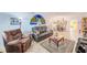 Bright and airy living room featuring tile flooring, comfortable seating, and dining space at 11200 102Nd Ave # 75, Seminole, FL 33778