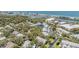 Aerial view of a residential community near the ocean, waterway and commercial buildings at 11440 Harbor Way # 5009, Largo, FL 33774