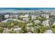 An aerial view of a coastal community with lush landscaping, water features and nearby ocean access at 11440 Harbor Way # 5009, Largo, FL 33774