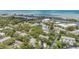 Stunning aerial view of the community with lush landscaping, water access, and beautiful coastal scenery at 11440 Harbor Way # 5009, Largo, FL 33774