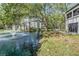 Scenic backyard with a pond view, a fountain and lush greenery creating a tranquil and inviting outdoor space at 11440 Harbor Way # 5009, Largo, FL 33774