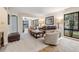 Comfortable living room featuring neutral tones, plush seating, and a view of the outdoor area at 11440 Harbor Way # 5009, Largo, FL 33774