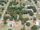 An aerial view of the real estate lot, revealing surrounding greenery and neighborhood at 12009 Glenshire Dr, Riverview, FL 33579