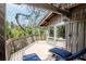 Outdoor deck area featuring lounge chairs with beautiful nature views at 1296 Weybridge Ln, Dunedin, FL 34698