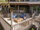 Outdoor patio space with furniture and a brick fire pit, perfect for gatherings at 1296 Weybridge Ln, Dunedin, FL 34698