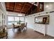 Charming dining area with bright windows, modern accents and warm, inviting atmosphere at 1296 Weybridge Ln, Dunedin, FL 34698