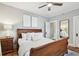 Light-filled bedroom with hardwood floors and ceiling fan at 135 12Th Ne Ave, St Petersburg, FL 33701
