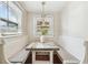 Bright breakfast nook featuring seating and a stylish marble table at 135 12Th Ne Ave, St Petersburg, FL 33701