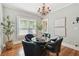Elegant dining room featuring a chandelier and stylish decor at 135 12Th Ne Ave, St Petersburg, FL 33701