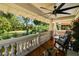 Charming front porch with seating and ceiling fan provides a welcoming entrance at 135 12Th Ne Ave, St Petersburg, FL 33701