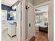 Hallway between bathroom and bedroom with hardwood floors at 135 12Th Ne Ave, St Petersburg, FL 33701