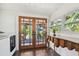 Laundry room with access to backyard patio at 135 12Th Ne Ave, St Petersburg, FL 33701