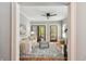 Open-concept living room with hardwood floors and view to the front porch at 135 12Th Ne Ave, St Petersburg, FL 33701
