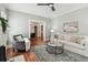 Bright living room with fireplace, hardwood floors, and comfortable seating area at 135 12Th Ne Ave, St Petersburg, FL 33701