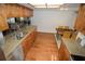 Charming kitchen with granite countertops, stainless steel appliances, and hardwood floors at 13511 Avista Dr, Tampa, FL 33624
