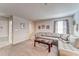 Cozy bonus room with comfortable seating and natural light, perfect for relaxation or entertainment at 13822 Harvestwood Ln, Riverview, FL 33569
