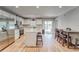 Bright, open kitchen with a center island, stainless steel appliances, and an adjacent dining area at 13822 Harvestwood Ln, Riverview, FL 33569