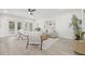 Cozy living room showcasing French doors, neutral decor, and stylish furniture arrangement at 13934 Clubhouse Cir # 8, Tampa, FL 33618