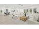 Stylish living room with French doors, contemporary furnishings, and an open-concept design at 13934 Clubhouse Cir # 8, Tampa, FL 33618