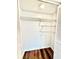 Open closet featuring wire shelving and bi-fold doors, in neutral tones at 141 Lakeside Dr, Oldsmar, FL 34677