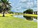 Community pond view on a sunny day at 141 Lakeside Dr, Oldsmar, FL 34677