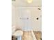 A bathroom shower with tiled walls and floor offers a refreshing and functional space at 141 Lakeside Dr, Oldsmar, FL 34677