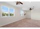 Bright, spacious bedroom with large windows overlooking tropical views at 17129 Breeders Cup Dr, Odessa, FL 33556