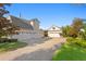 Expansive home with multi-car garage and interlocking brick driveway amid landscaped lawns at 17129 Breeders Cup Dr, Odessa, FL 33556
