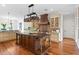Spacious kitchen with wooden cabinets, large island, and modern appliances at 17129 Breeders Cup Dr, Odessa, FL 33556