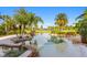 Beautiful backyard pool and landscaping with golf course view at 17129 Breeders Cup Dr, Odessa, FL 33556