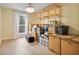 Bonus room with wood floors, a decorative ceiling fan, and large window at 18107 Sugar Brooke Dr, Tampa, FL 33647