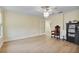 Bonus room boasts natural light, wood floors, and decorative ceiling fan at 18107 Sugar Brooke Dr, Tampa, FL 33647