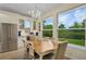 Eat in kitchen with stainless steel appliances and bright natural light from three large picture windows at 18107 Sugar Brooke Dr, Tampa, FL 33647