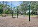 Outdoor playground featuring swings with a bench seat in a well-maintained and landscaped community area at 18107 Sugar Brooke Dr, Tampa, FL 33647