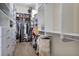 Spacious walk-in closet with custom shelves and storage for clothes, shoes, and accessories at 18107 Sugar Brooke Dr, Tampa, FL 33647