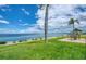 Scenic backyard featuring waterfront views, outdoor seating, and lush landscaping for relaxed outdoor living at 19029 Us Highway 19 N # 31F, Clearwater, FL 33764