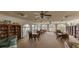 Bright community room with reading nooks, large windows, and comfortable seating arrangements at 19029 Us Highway 19 N # 31F, Clearwater, FL 33764