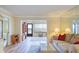 Open floor plan with hardwood floors and view of the waterway at 19029 Us Highway 19 N # 31F, Clearwater, FL 33764