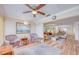 Spacious living area provides ample seating, wood floors, and great natural lighting at 19029 Us Highway 19 N # 31F, Clearwater, FL 33764