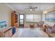 Charming sitting area features floor to ceiling windows with water views at 19029 Us Highway 19 N # 31F, Clearwater, FL 33764
