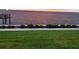 Scenic waterfront view at dusk with manicured landscaping and path lighting, perfect for evening strolls at 19029 Us Highway 19 N # 31F, Clearwater, FL 33764