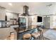 Modern kitchen with a spacious island, stainless steel appliances, and stylish gray cabinetry at 2122 W Ferris Ave, Tampa, FL 33603