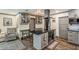Modern kitchen with a spacious island, stainless steel appliances, and stylish gray cabinetry at 2122 W Ferris Ave, Tampa, FL 33603