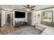 Inviting living room featuring wood floors, modern decor, and an open layout at 2122 W Ferris Ave, Tampa, FL 33603