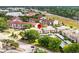 Aerial view of residential community with buildings and landscaped grounds at 2597 Countryside Blvd # 206, Clearwater, FL 33761