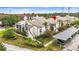Exterior view of building showcasing well-maintained landscaping and convenient parking at 2597 Countryside Blvd # 206, Clearwater, FL 33761
