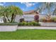 Well-manicured landscaping surrounding the Highland Ridge deed restricted community sign at 2816 Manor Hill Dr, Brandon, FL 33511