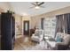 Inviting living room with wood floors, natural light, and views of the front yard at 2816 Manor Hill Dr, Brandon, FL 33511