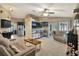 Open concept living room and kitchen area with great flow and sight lines, with neutral colors and carpet at 2816 Manor Hill Dr, Brandon, FL 33511